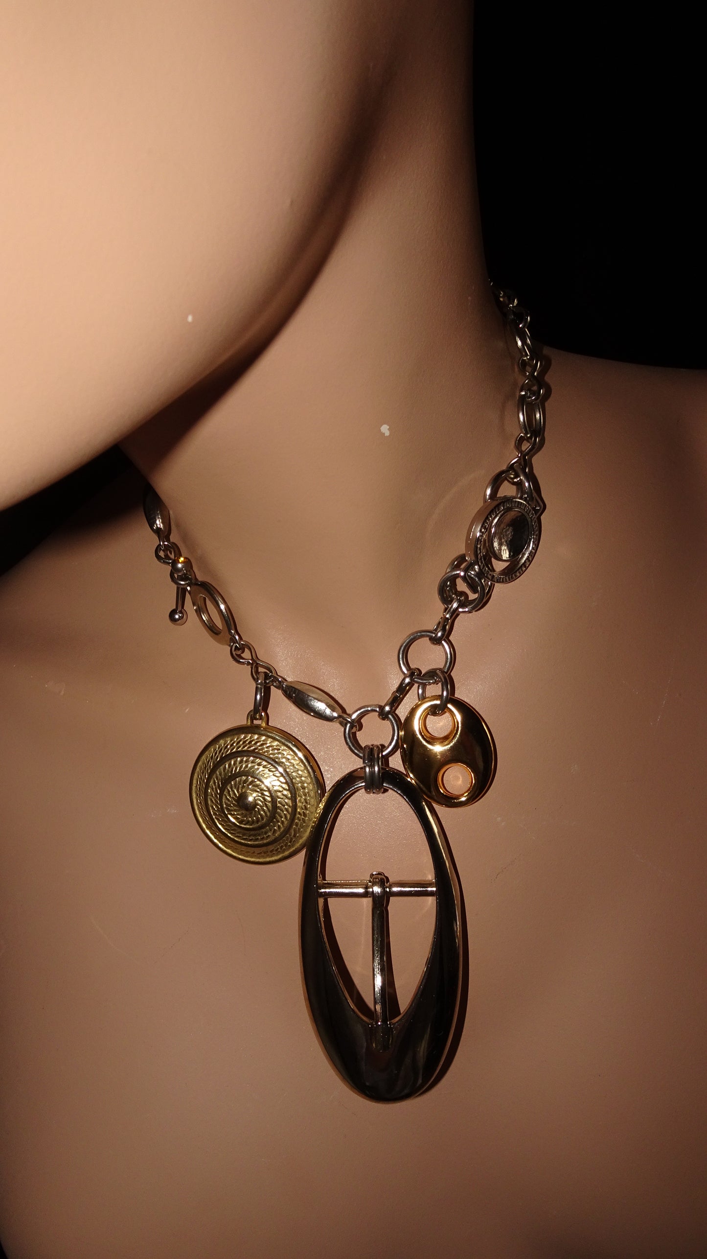 Bold statement necklace by weARCHIVE with upcycled mixed stainless steel charms on a chunky stainless steel chain.