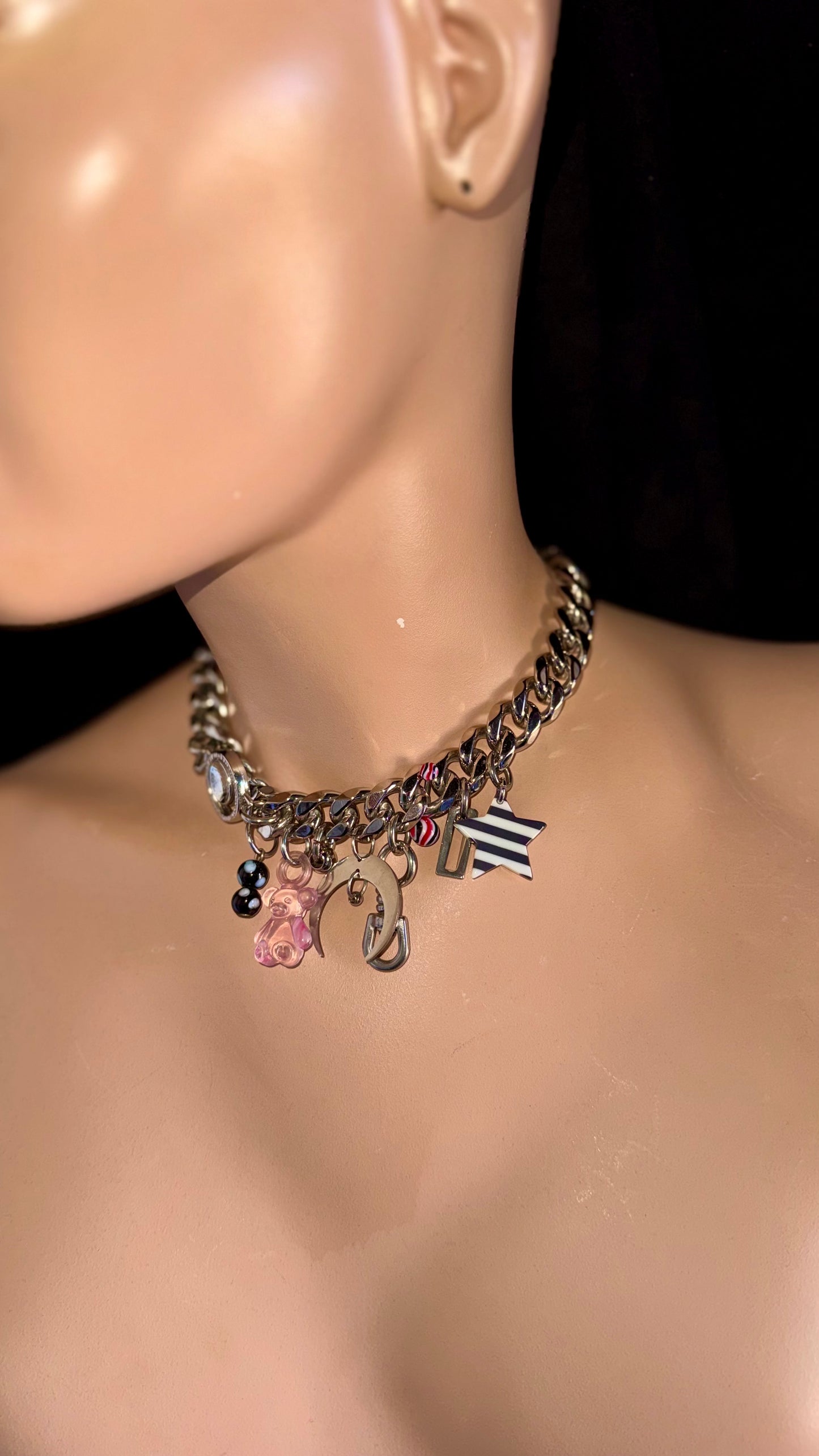 stainless steel charm choker with pink bear charm and striped star 
