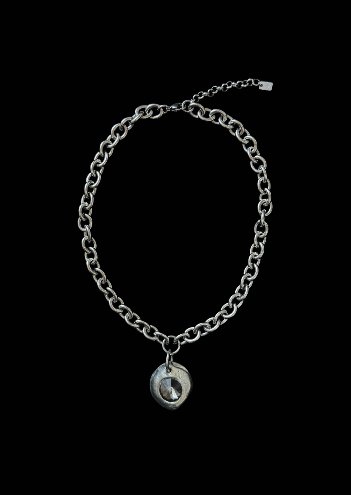 stainless steel choker with melted pendant and dark stone