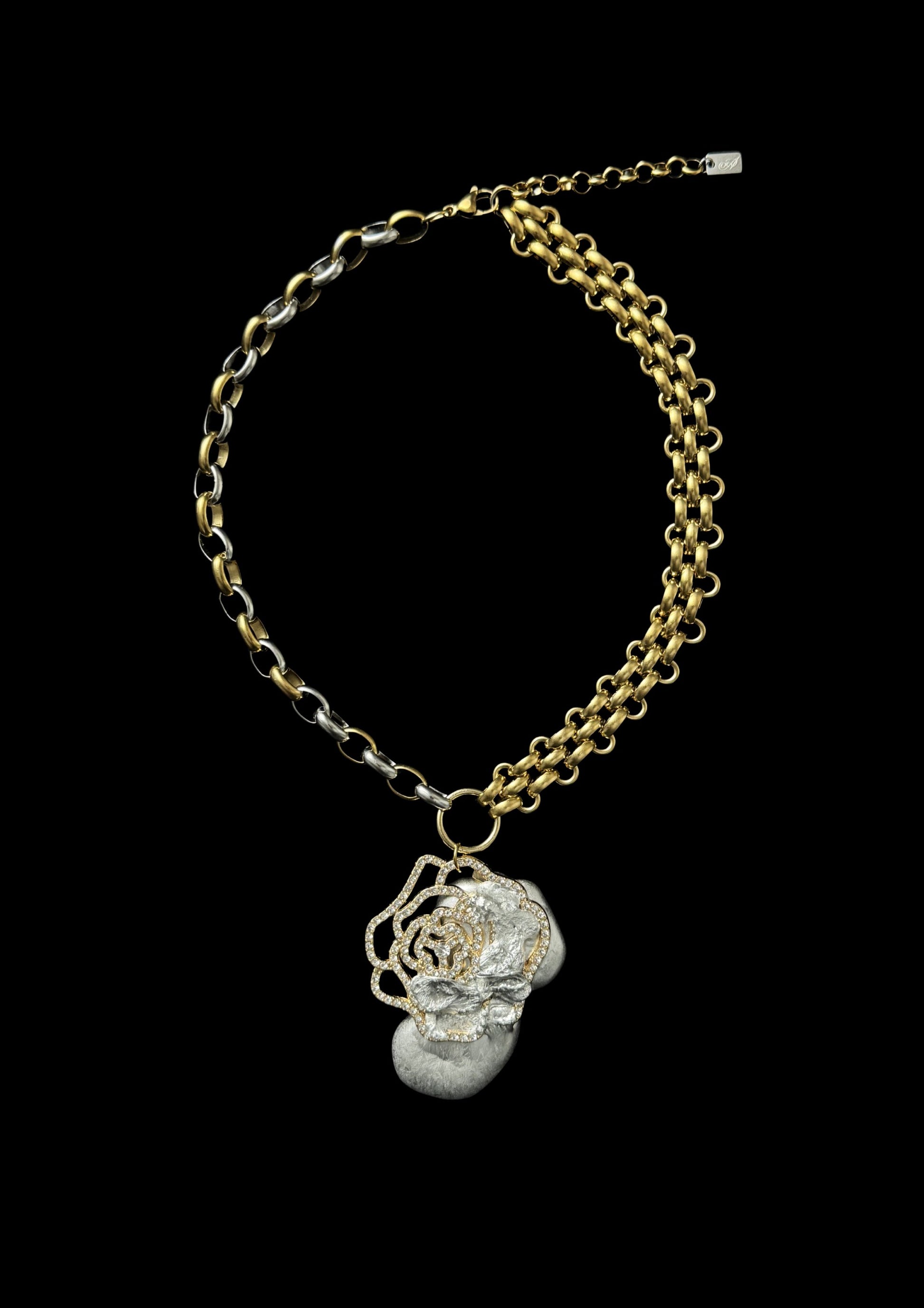 sculptural rose pendant necklace mixed metal chain detail