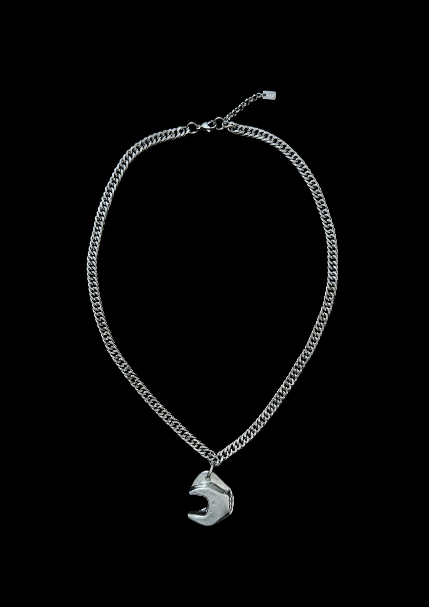 statement chain necklace with sculptural tool pendant