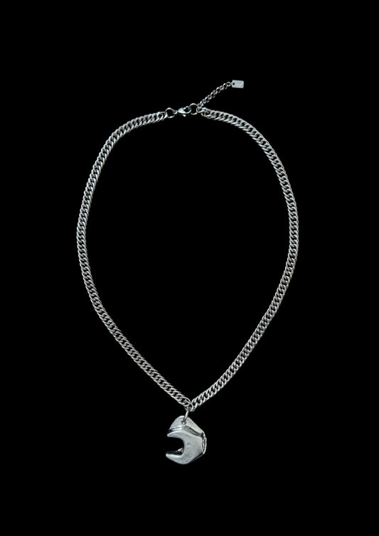 statement chain necklace with sculptural tool pendant